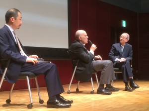 The two speakers engaging the audience during a panel discussion
