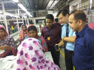 Dr. Wichai Chattinnawat (2nd R) on a factory visit to Blue Ocean Factory Limited to collect data with NPO Officers Ripon Saha (3rd R) and Syed Zayed-ul-Islam (R).