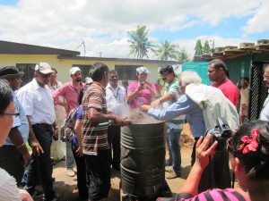 Participants learning how to sterilize growth media using a simple, cost-effective method to raise healthy seedlings at the Pacific Harvest Co. Ltd. nursery. 